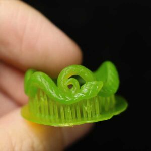 Green snake - shaped ring print made from IFUN 700D green castable resin, showcasing low shrinkage and accurate dimension restoration as per the design.