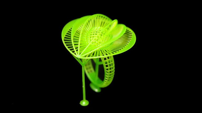 3D printed green resin flower ring with complex structure