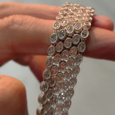 Detailed view of a wide silver multi-row bracelet, demonstrating high-precision casting from a 3D printed T800 resin pattern, featuring intricate bezel-set oval stones.