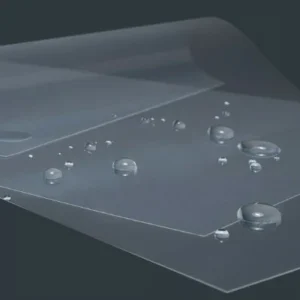 Macro close-up of clear, non-stick release films for 3D printing. Large water droplets are beaded up on the surface, demonstrating high hydrophobicity and low surface energy against a dark grey background.