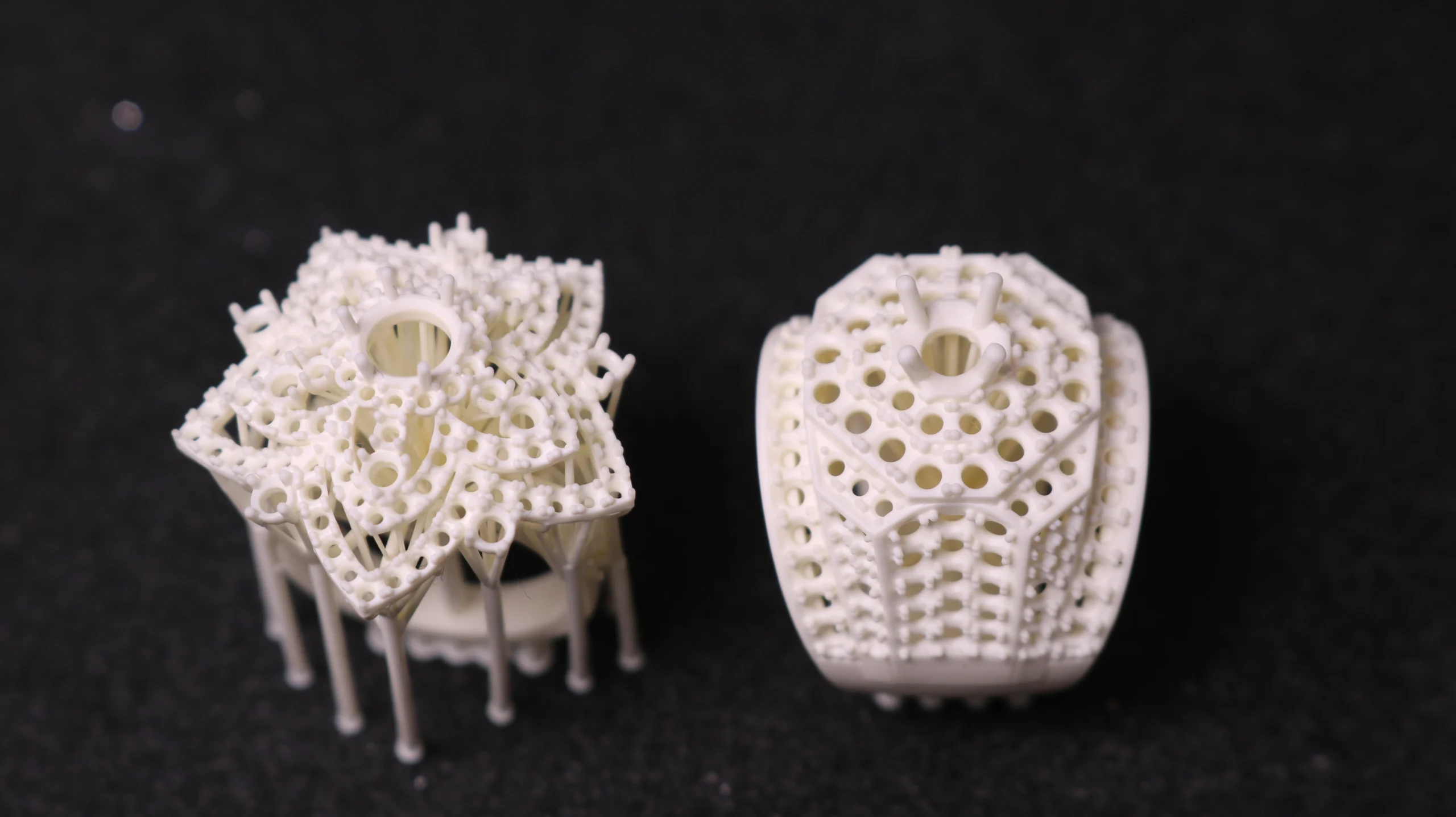 Top view of 800D white wax resin 3D printed star and octagon pave statement ring mountings
